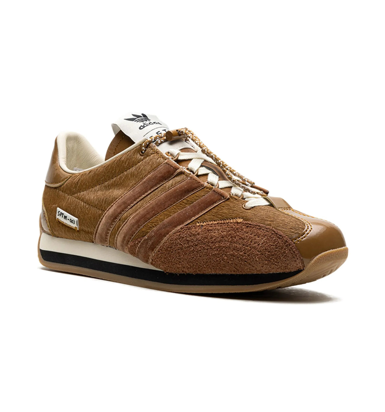 Adidas x SFTM “bronze” sneaker